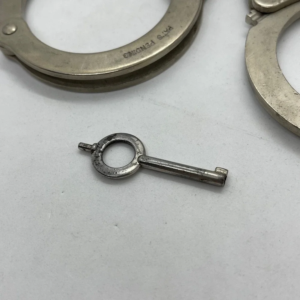 Vintage Smith & Wesson Handcuffs Model 100 Silver Restraints with Key S&W Cuffs